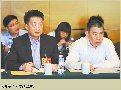 楊文龍董事長出席全國政協十二屆三次會議